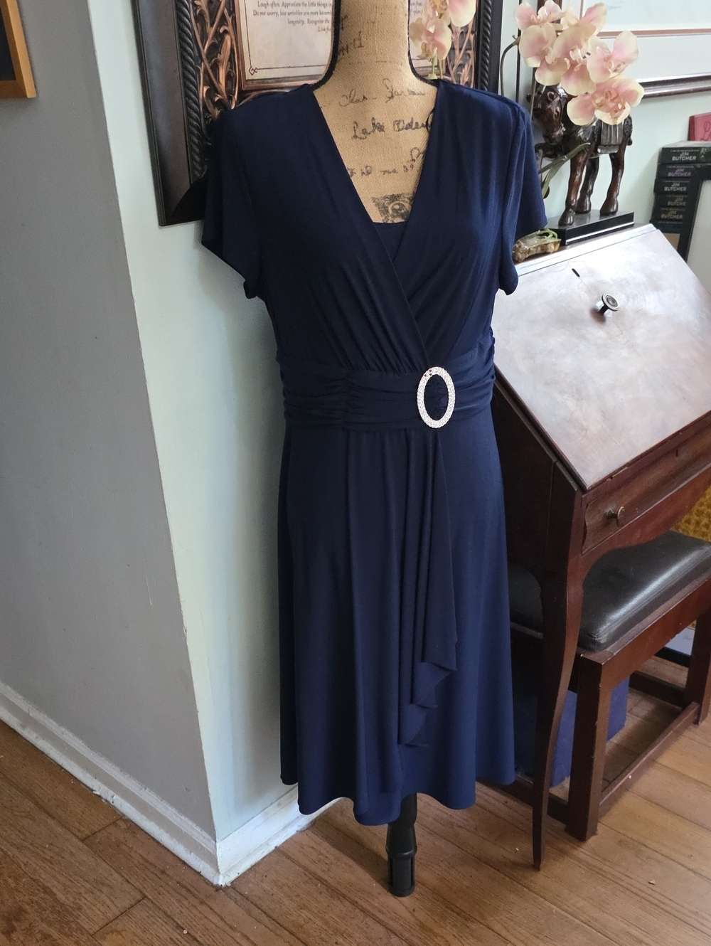 Classic Navy Faux-Wrap Dress with Ruched Waist and Rhinestone Buckle